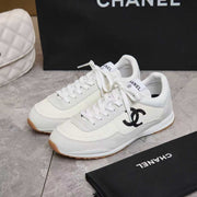 Chanel 2026 Sneaker White Black Fabric And  Embossed Suede Calfskin
