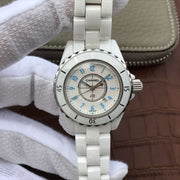 J12 WHITE CERAMIC 33MM BLUE NUMERALS