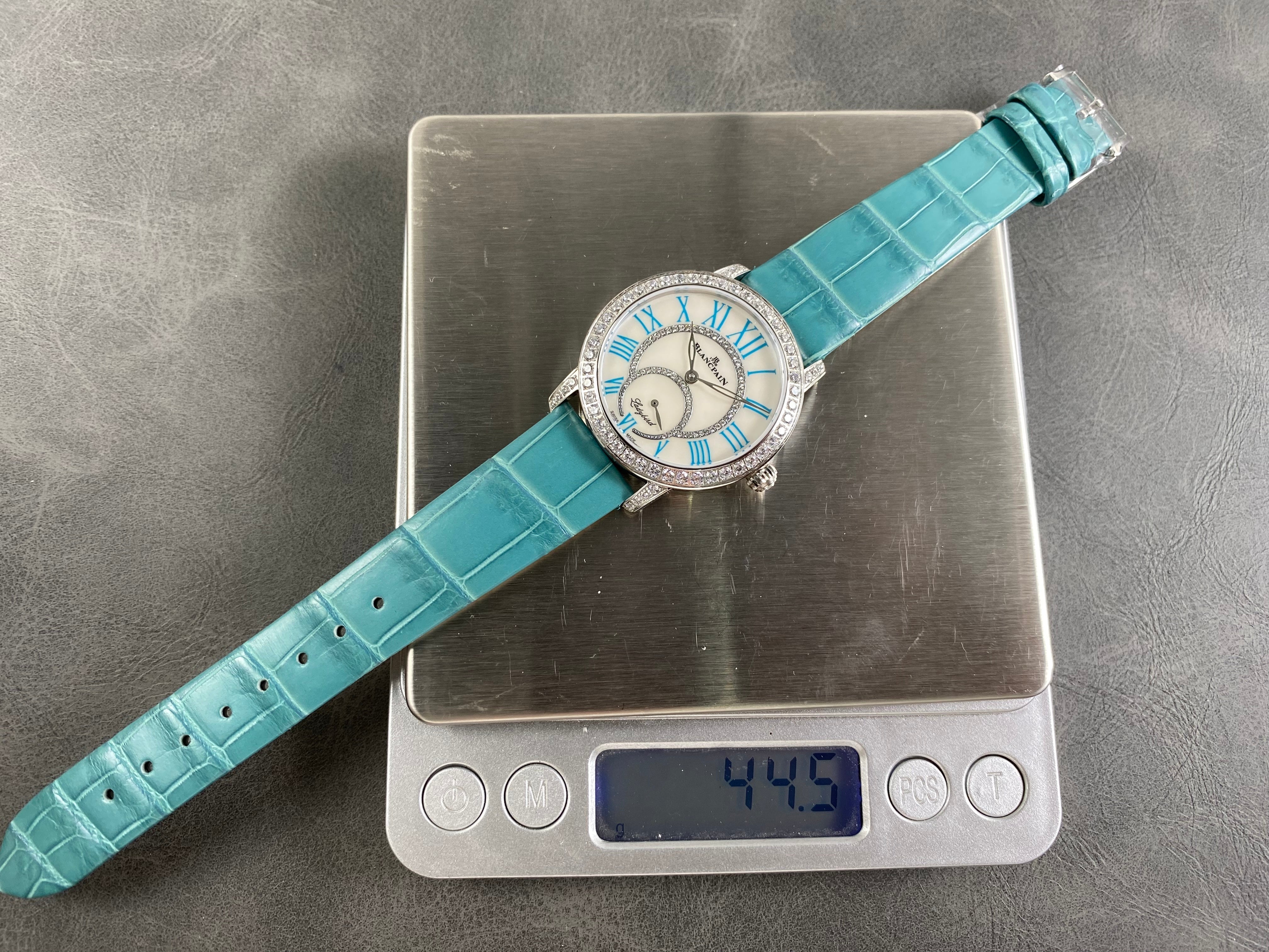 Blancpain's Ladybird 35mm White Blue Dial Diamond Bezel Crocodile Leather