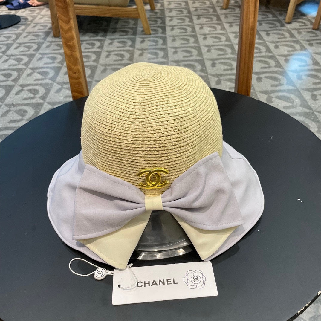 BOW BUCKET HAT IN PALE PURPLE MIX BEIGE RAFFIA 426169