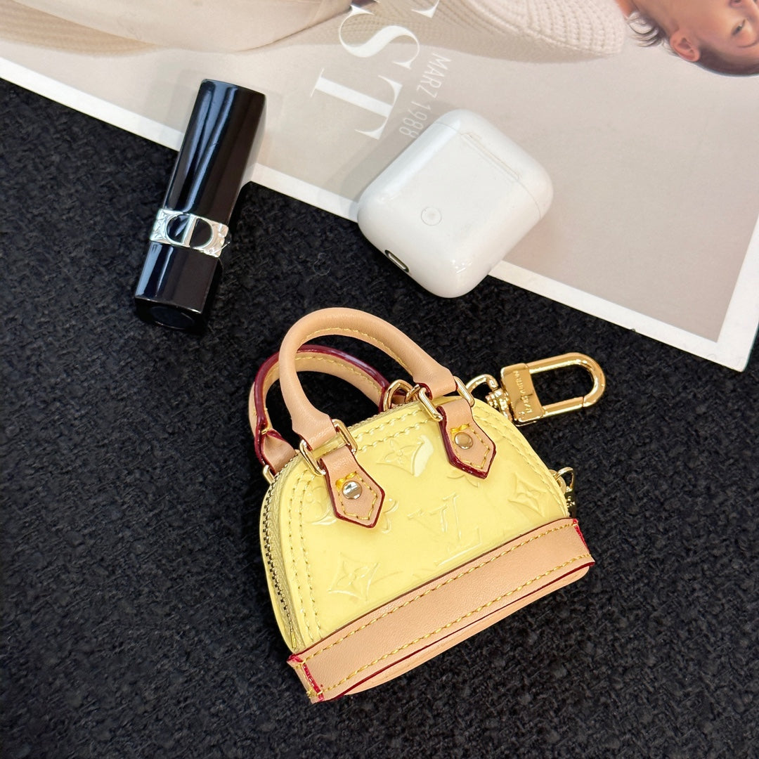 LV Alma Bag Charm Yellow mix Beige Cowhide Canvas