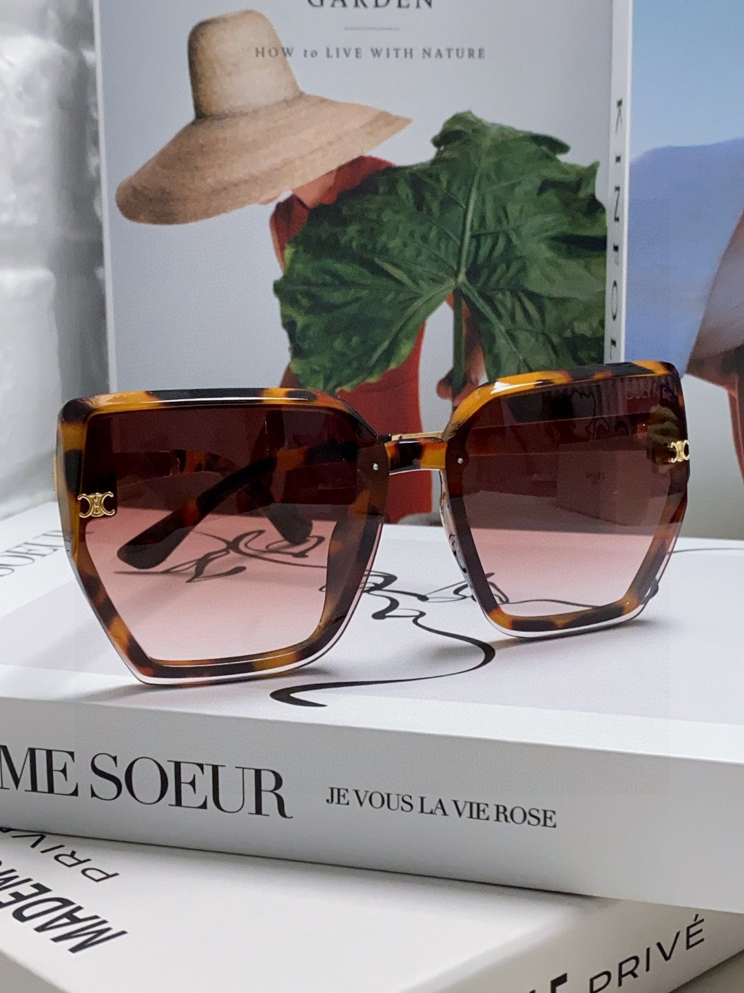 TRIOMPHE SUNGLASS 497830 IN HAVANA ACETATE EMBOSSED LOGO